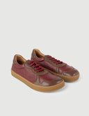 Deportiva barefoot en piel burdeos y chocolate hecha en España. SHUU Barefoot
